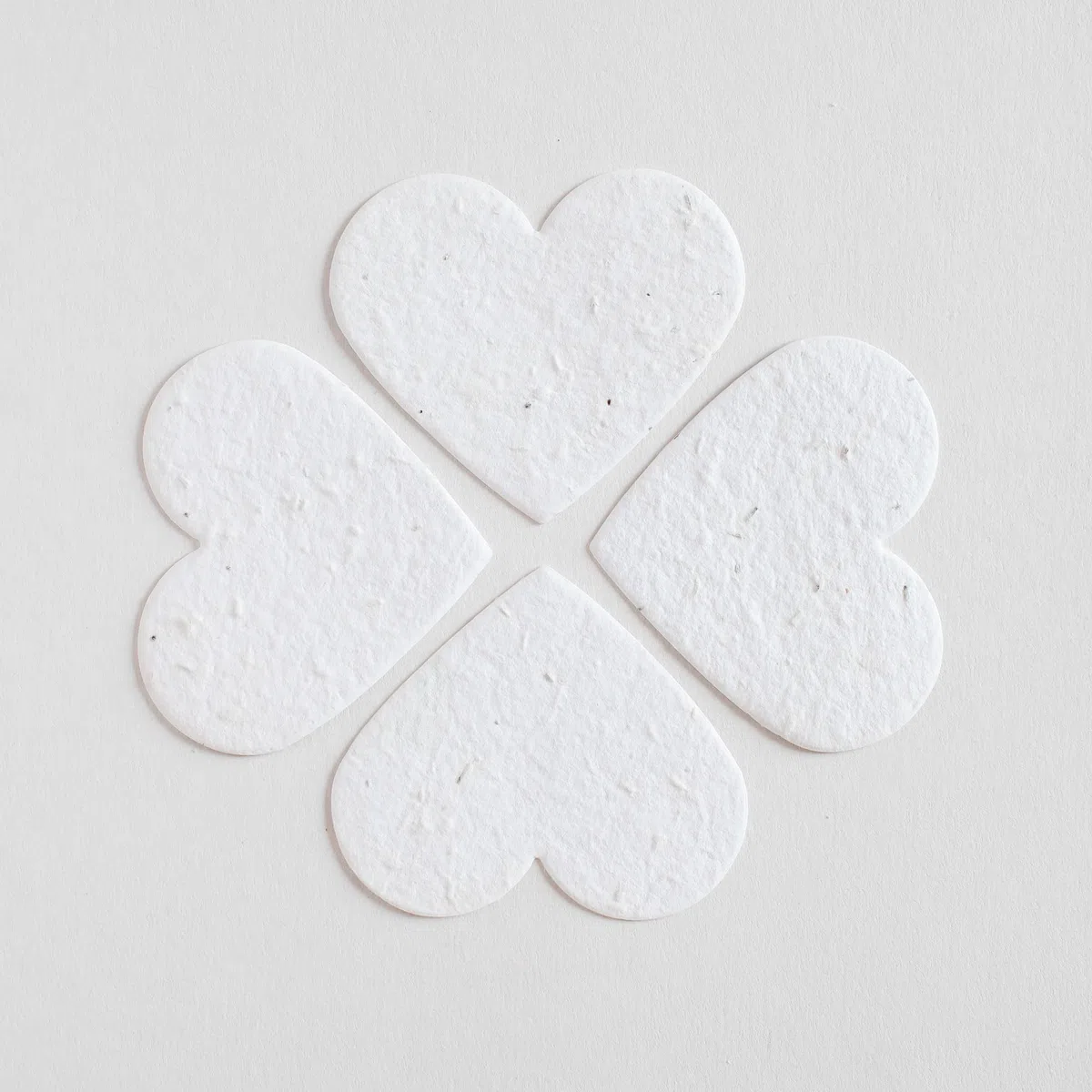 Blooming Herzen aus Papier, gesät, 25 Stück, für Hochzeit, zum Einpflanzen, blanko, 6,3 x 6,3 cm, 300 g/m², weiß, biologisch abbaubar, Wildblumensamen